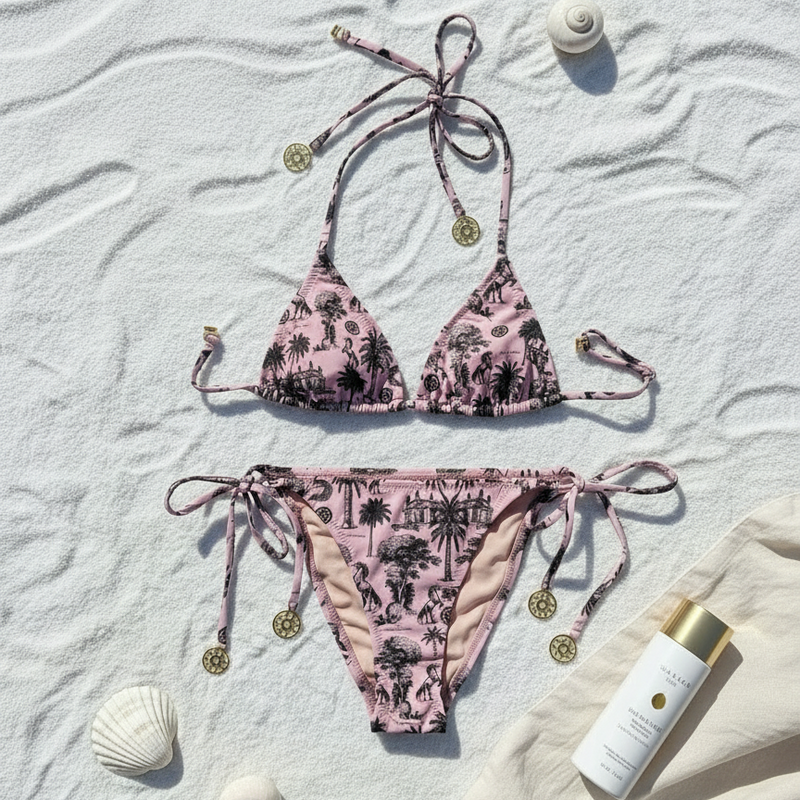 Minimalist flat lay with pink horse print bikini